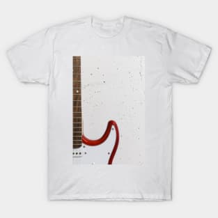 Red electric guitar close-up against white raw wall T-Shirt